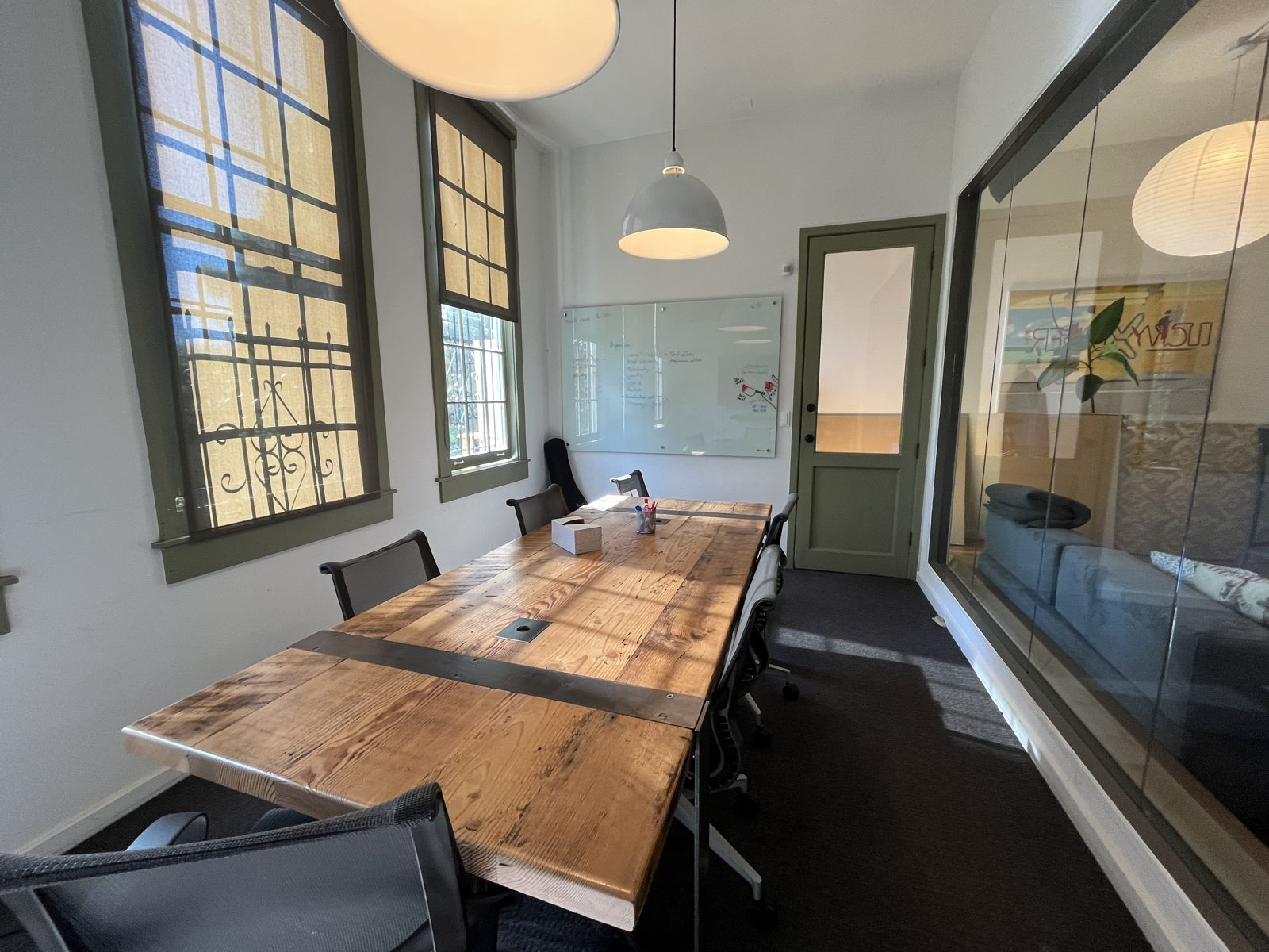 The conference room glass wall by the display